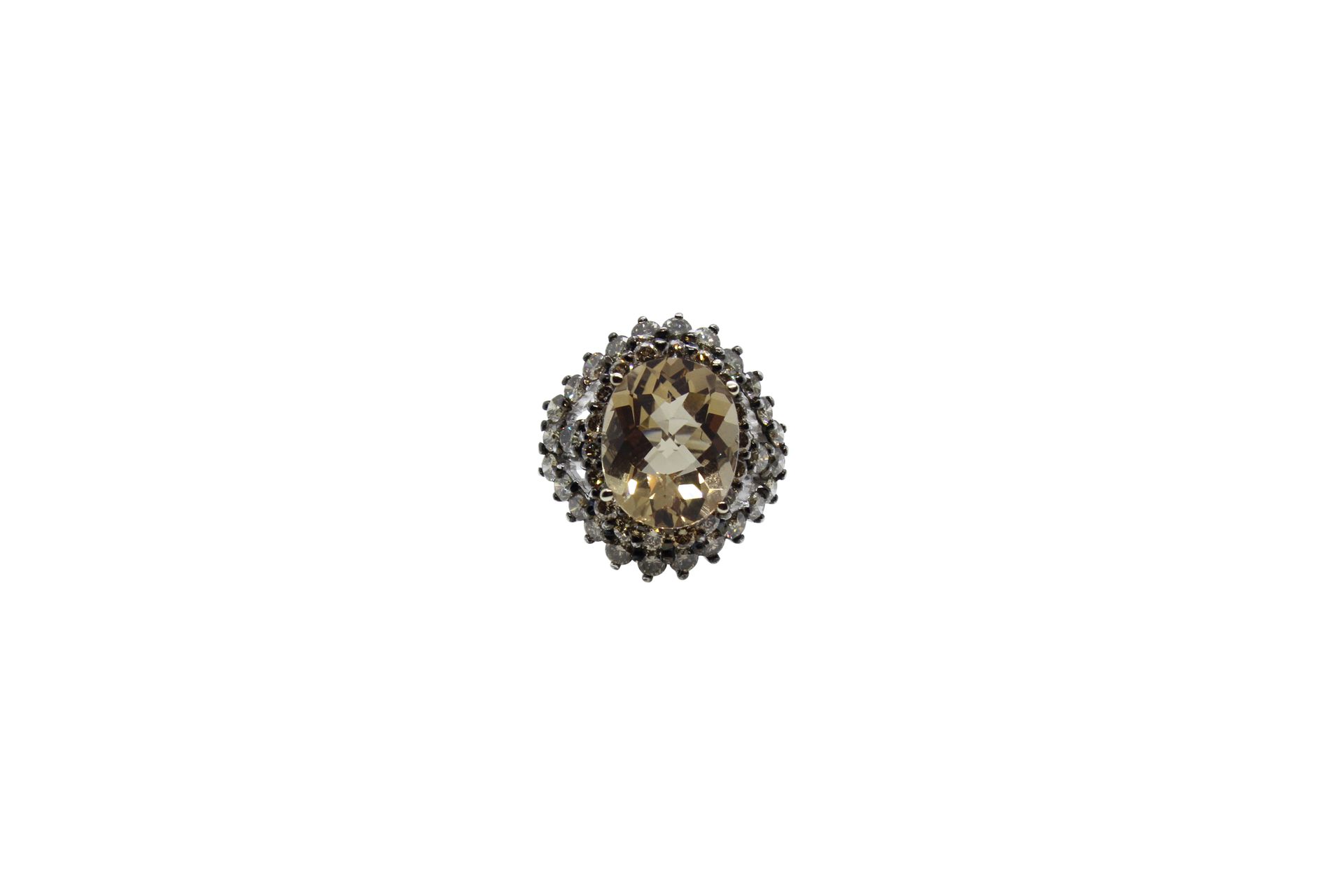14k gold ring with approx. 2 ct diamonds and center topaz stone 
Bague en or 14k&hellip;