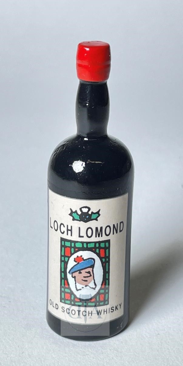 Null 
Hergé/Tintin. Ref Pixi 5611 l'objet du mythe "La bouteille de Loch Lomond"&hellip;