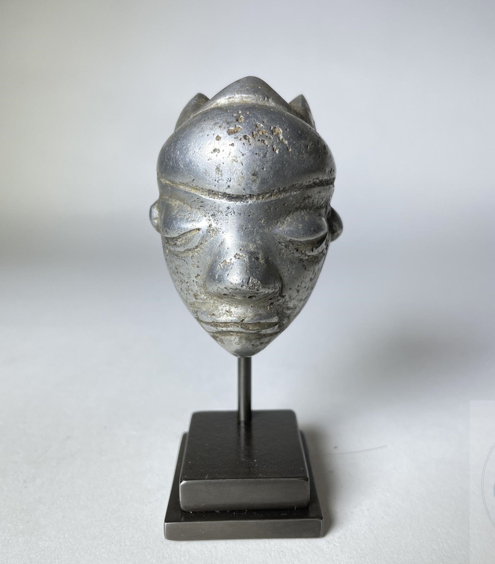 Null Female pendant "Ikhoko" in the form of a miniature mask. Pende, DRC. Alumin&hellip;