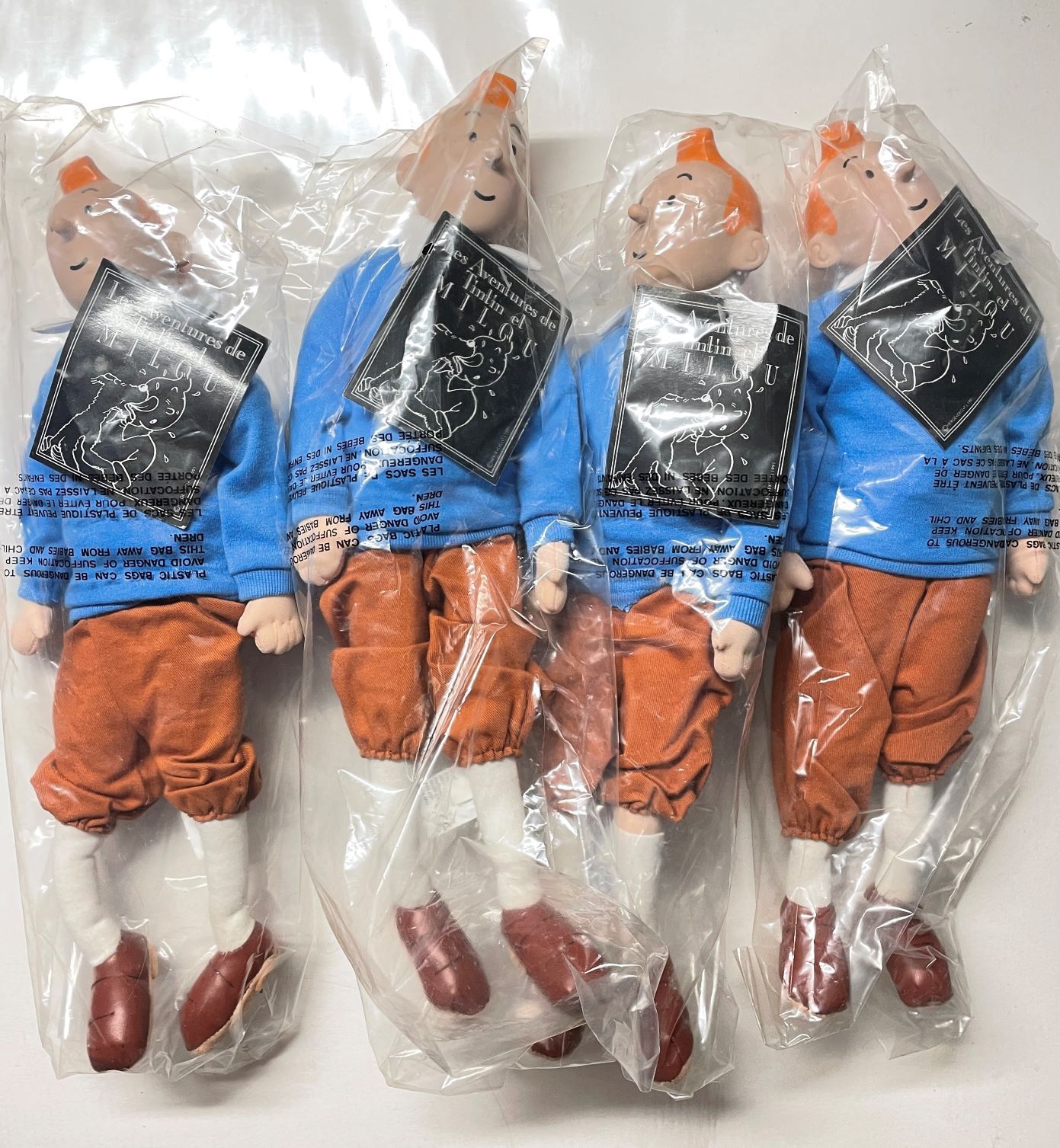 Null Hergé/Titin. Set of 4 dolls with the effigy of Tintin. Cotton and rubber ve&hellip;