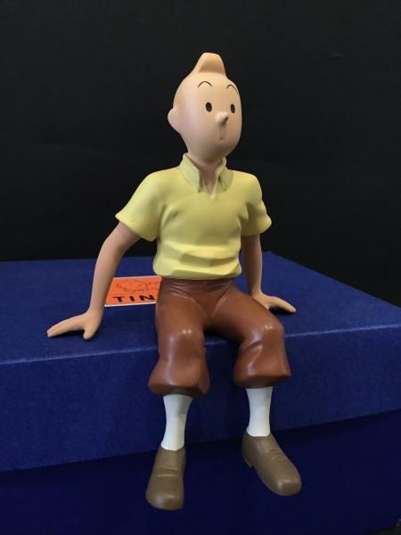 Null Hergé/Tintin. Sculpture representing Tintin sitting from the album "The Cig&hellip;