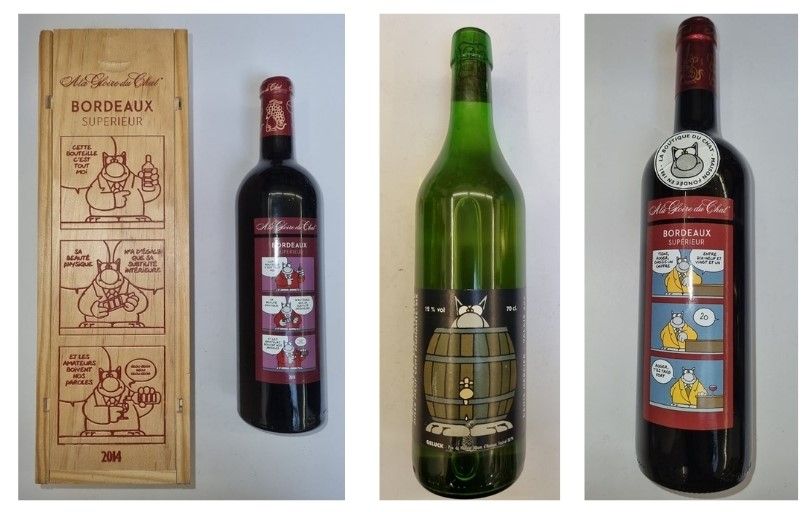 Null Geluck/Le Chat. Trio de bouteilles de vin: Bordeaux supérieure 2014 dans un&hellip;
