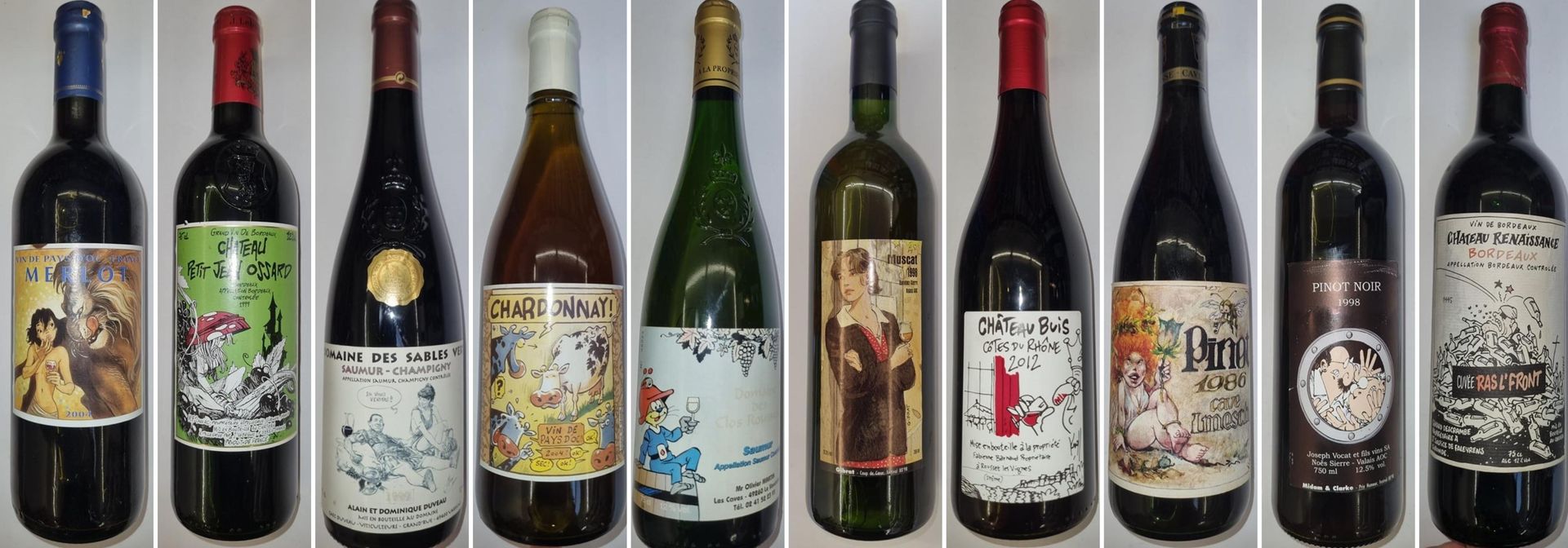 Null Set of 20 bottles of wine, decorated by various comic authors. TBE+.