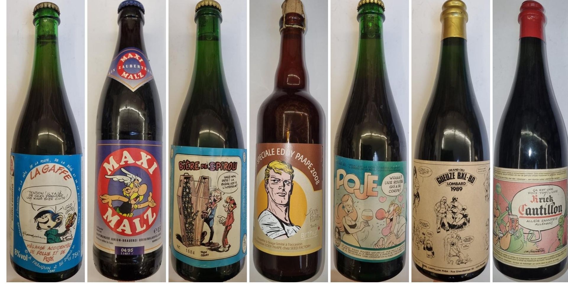 Null Set of 7 beer bottles decorated by the following authors: Franquin, Uderzo,&hellip;