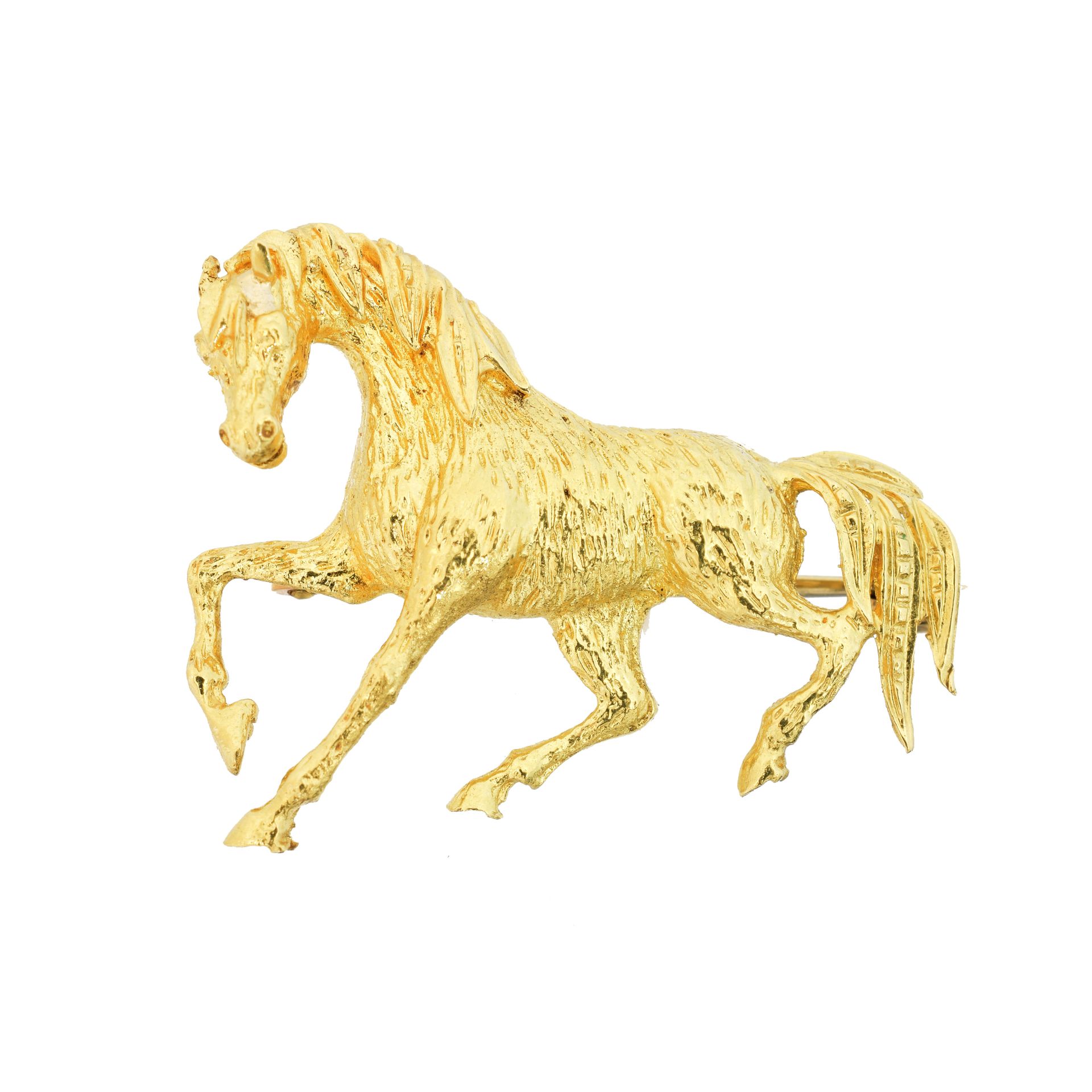 An 18ct gold brooch, 
一枚18K金胸针，设计为一匹有纹理的马，进口标记为爱丁堡，长3厘米，毛重5.3克。

整体状况良好

胸针可以使用
&hellip;