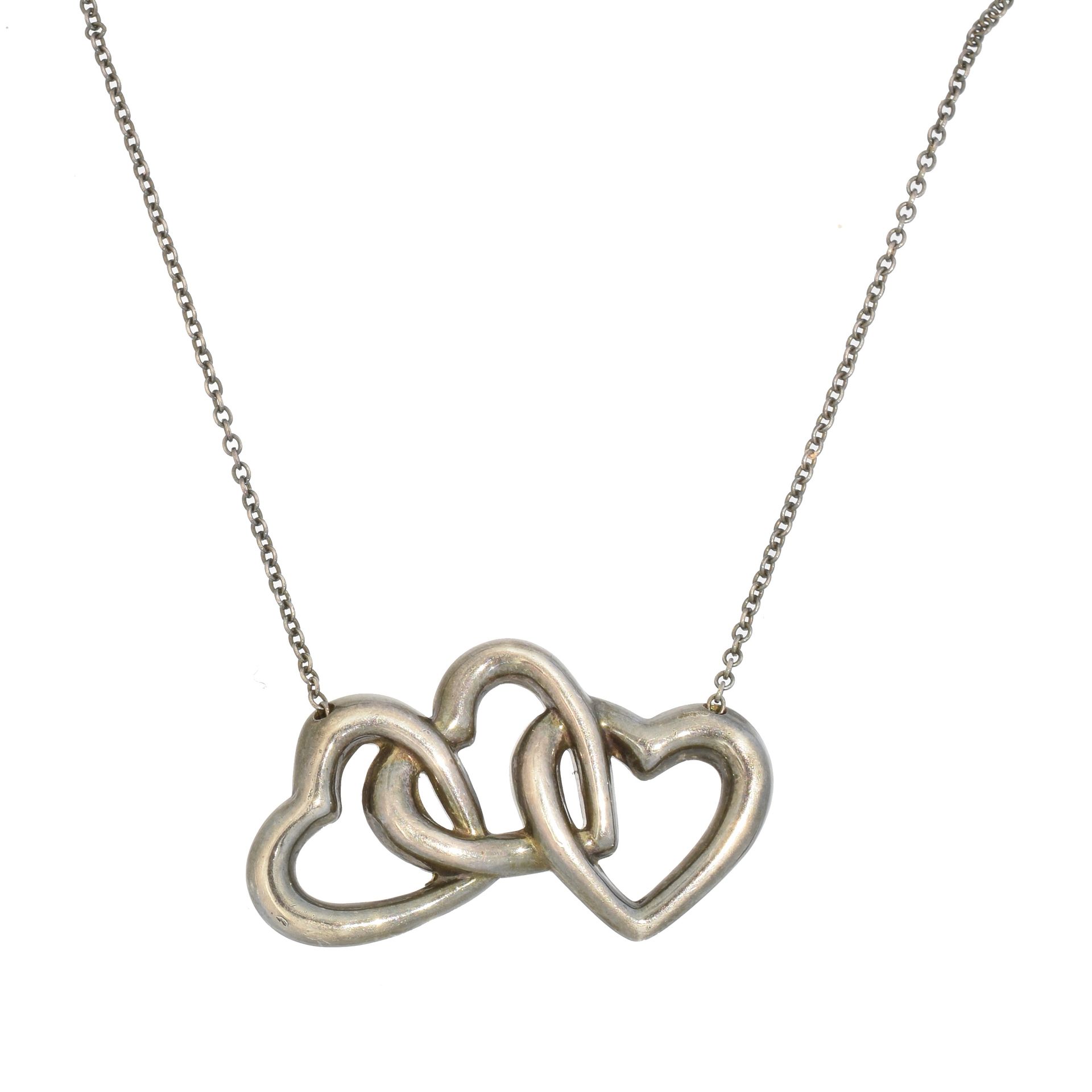 A Tiffany & Co. Triple Heart Necklace, 
Un collier à trois cœurs de Tiffany & Co&hellip;