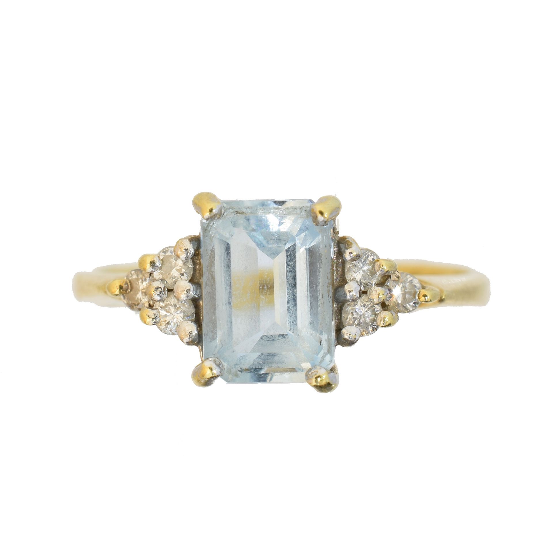 An 18ct gold aquamarine and diamond dress ring, 
An 18ct gold aquamarine and dia&hellip;