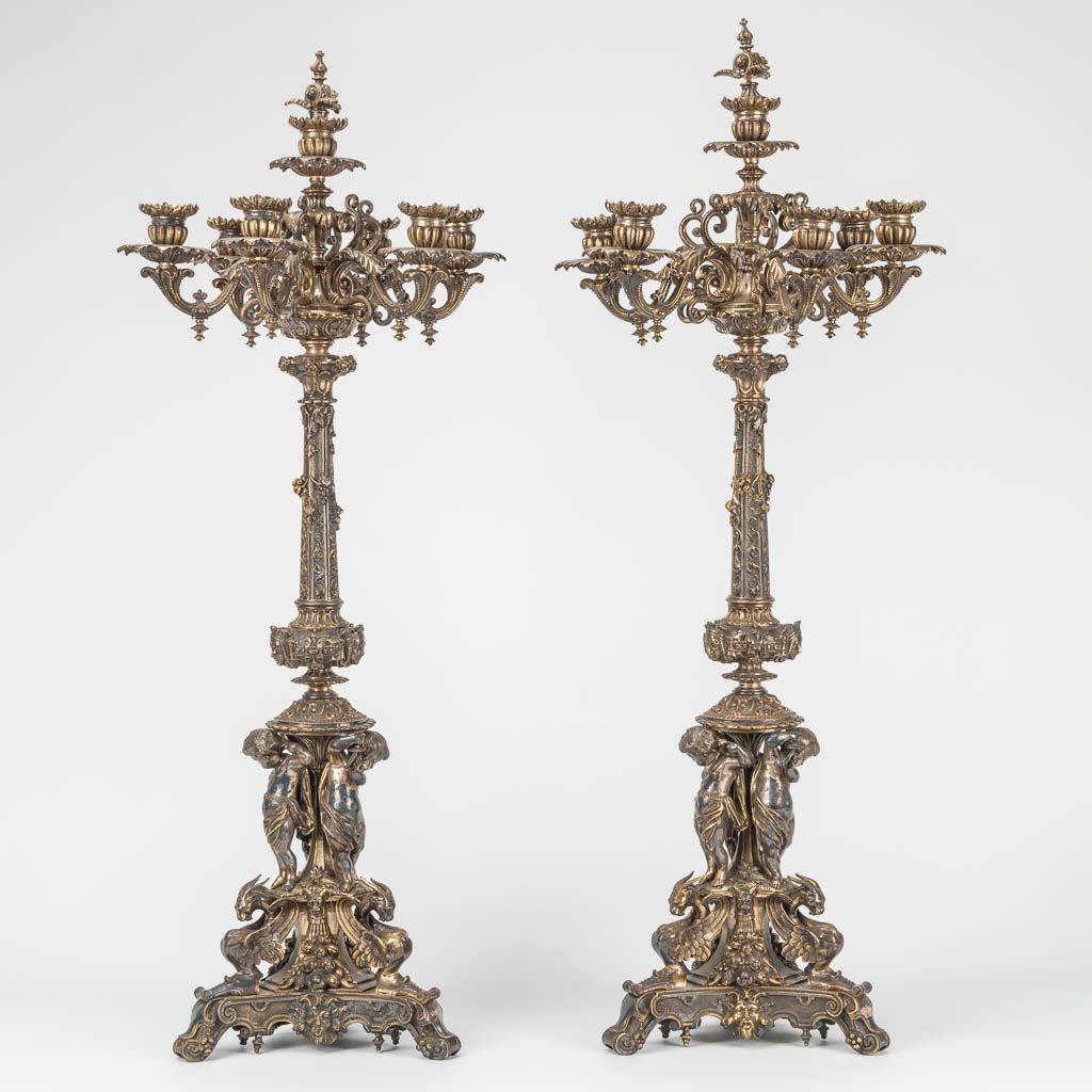 Null A pair of exceptional and large silver-plated bronze candelabra with musica&hellip;