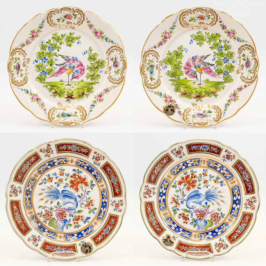Null A collection of 2 pairs of faience display plates with hand-painted decor a&hellip;