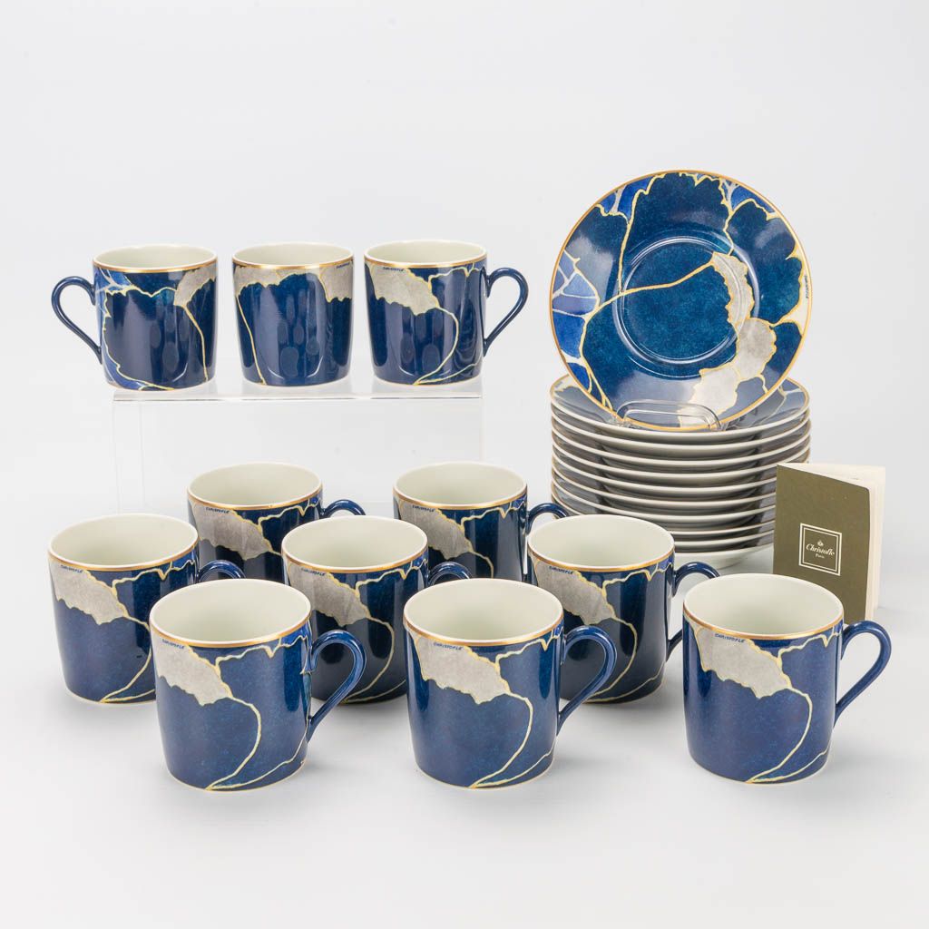 Null A collection of 11 Christofle 'Orientalys' coffee and tea cups with saucers&hellip;