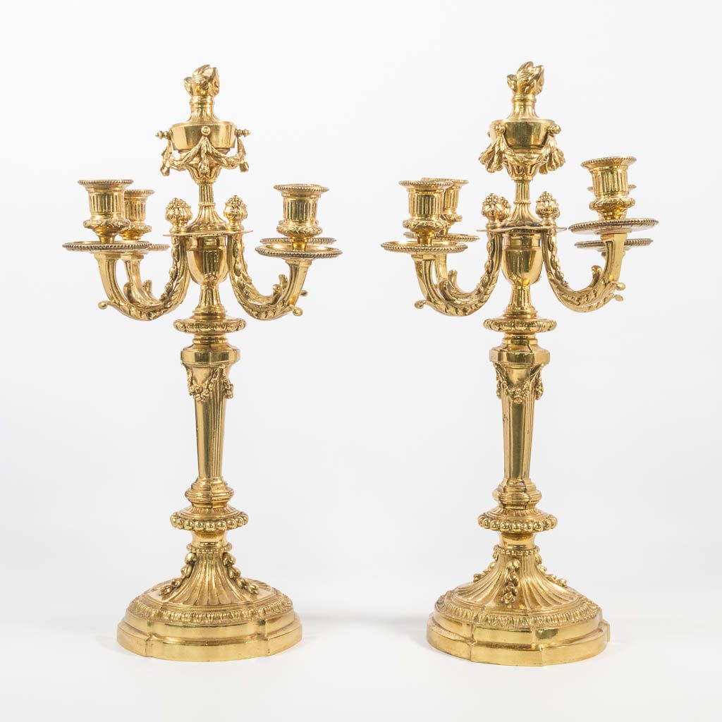 Null A pair of bronze candelabra in Louis XVI style, marked H. Luppens en Cie, B&hellip;