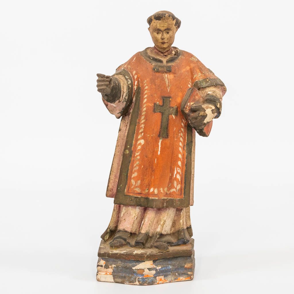 Null A sculptured wood statue of a holy figurine, with book. 18th century. (7,5 &hellip;