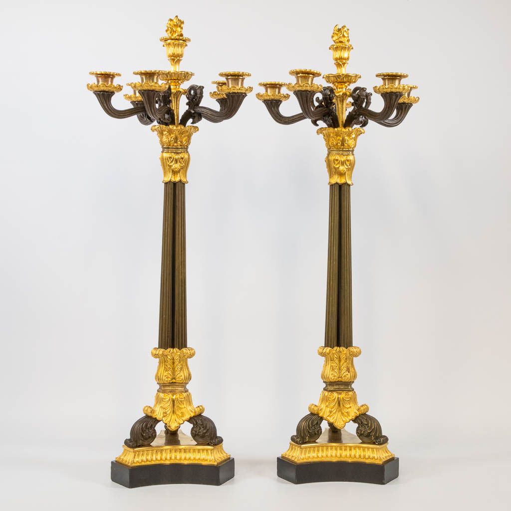 Null A pair of candelabra, empire style, combination of patinated and gilt bronz&hellip;