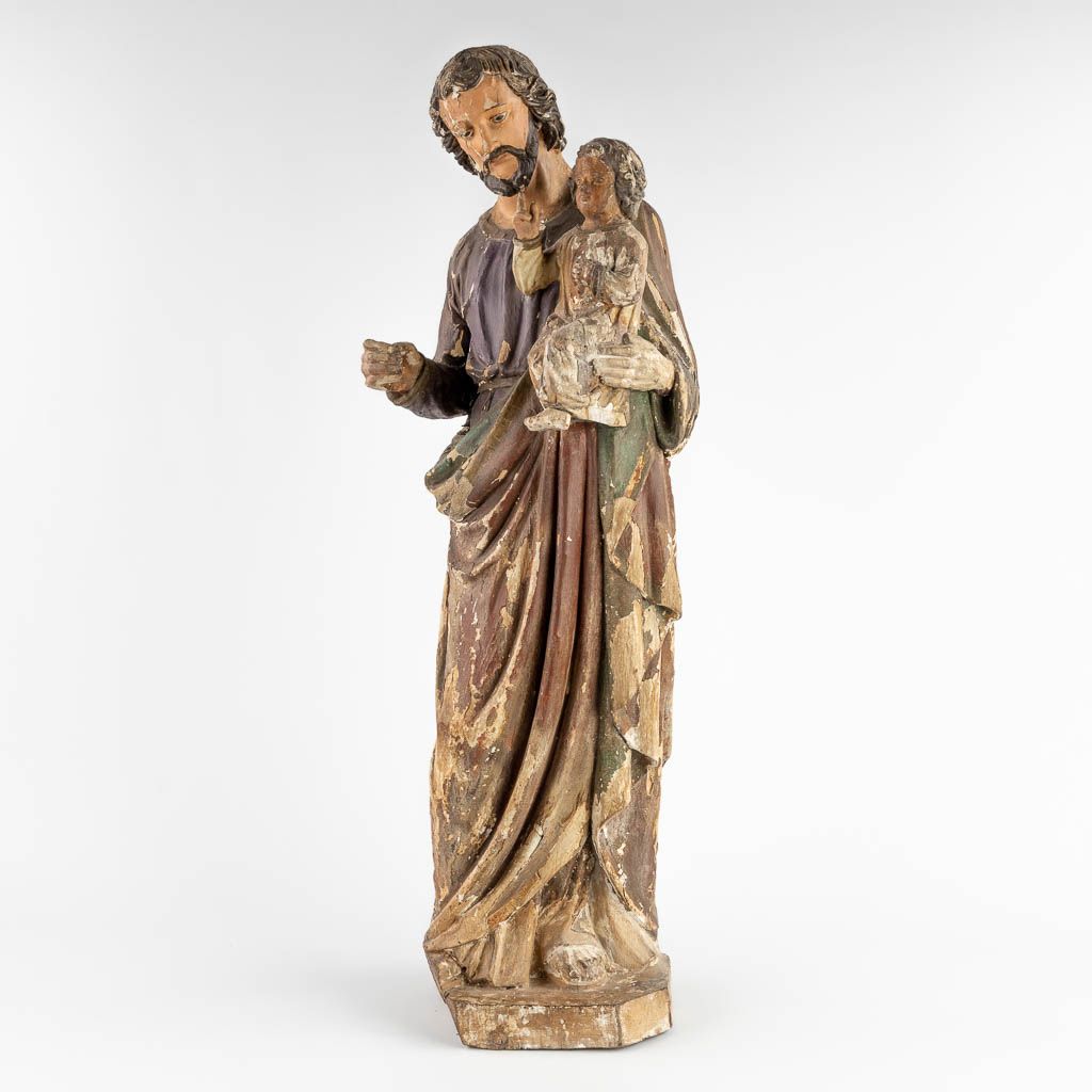 Null 
一个古董木雕，约瑟夫和孩子，原始的多色性，19世纪。 


尺寸。
(高：87厘米)