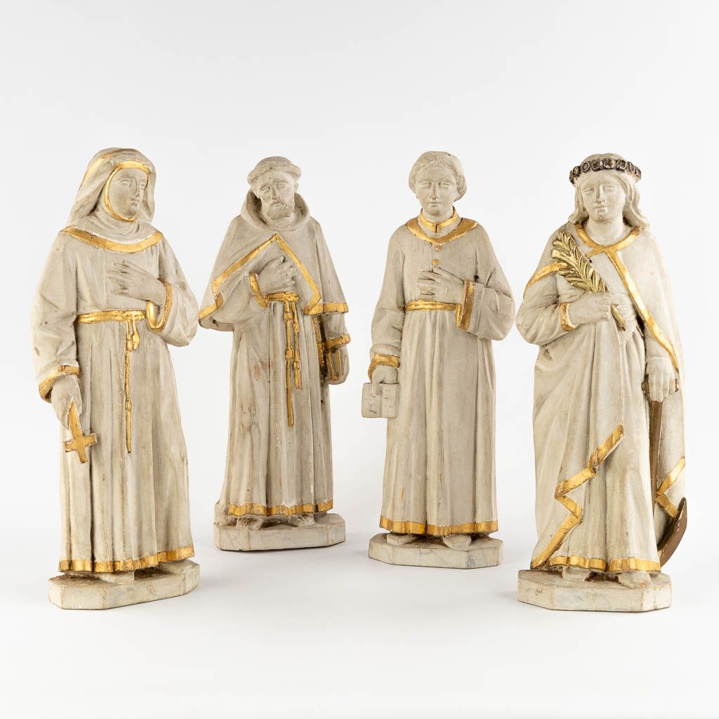 Null 
Four wood sculptured Holy figurines, 19th century. 


Dimensions:(H:39 cm)