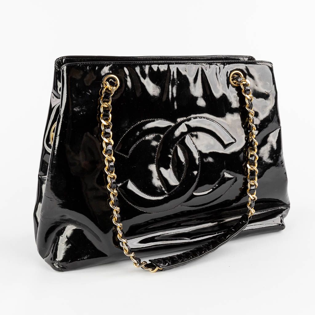 Chanel 'Black Patent CC Shoulder Bag' a purse made of le…