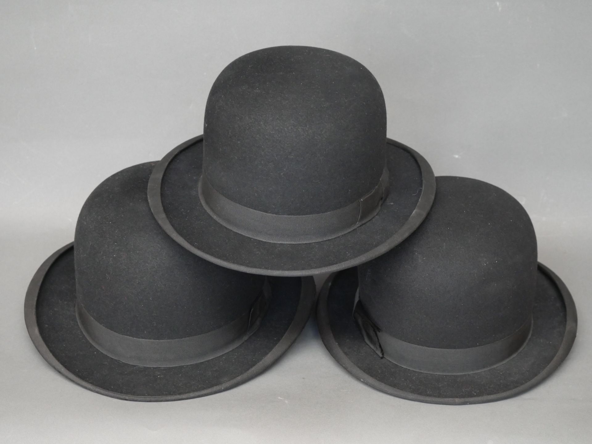 Null LOT of three black felt bowler hats.