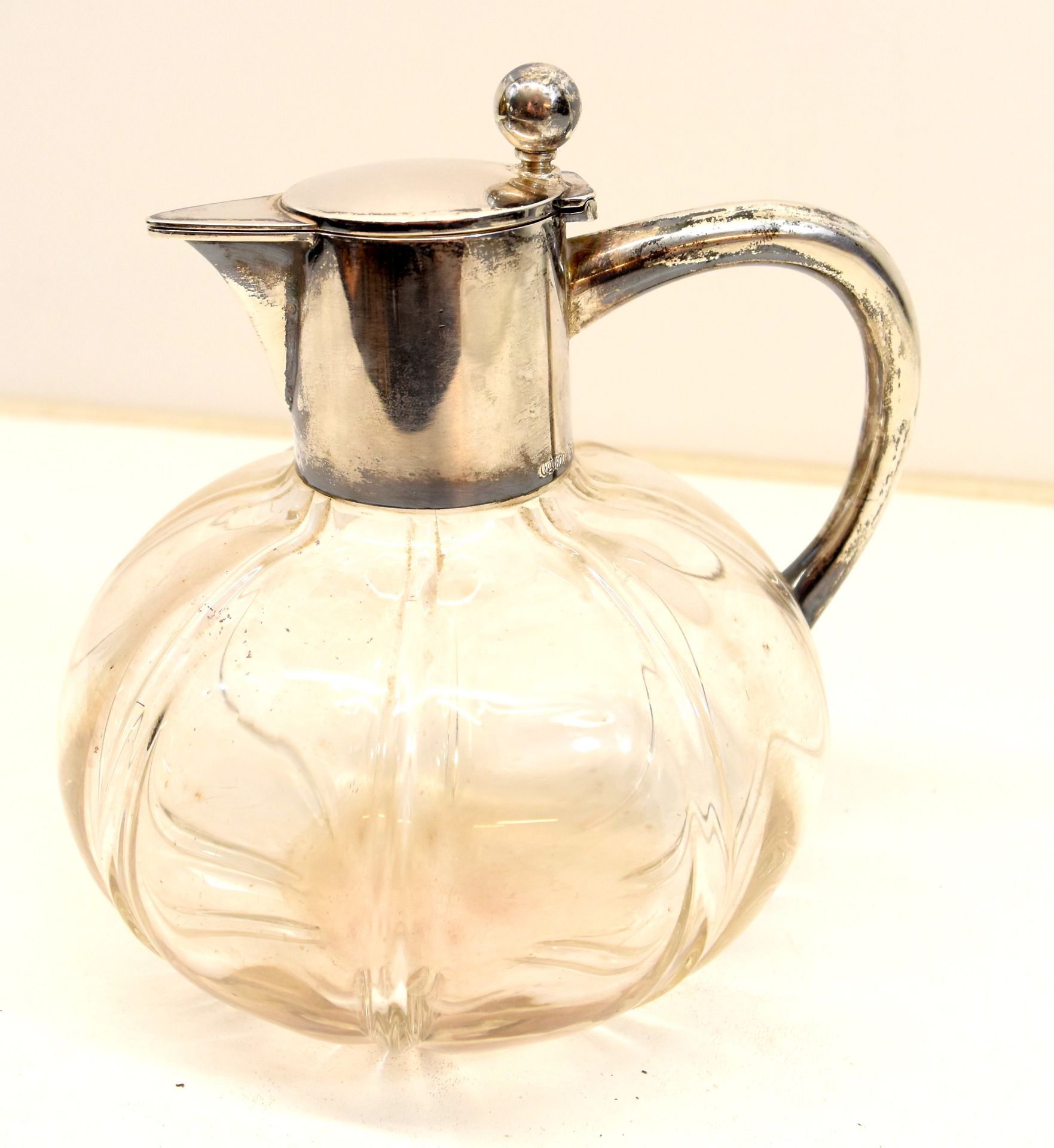 Null Glass jug with silver part 800/1000 stamped (H: 16 cm) \nBeschrijving in he&hellip;