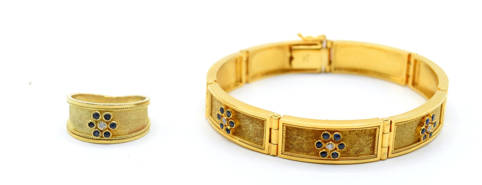 Null Bague et bracelet en or jaune 18 ct serti de 7 brillants +/- 0.14 ct (pierr&hellip;