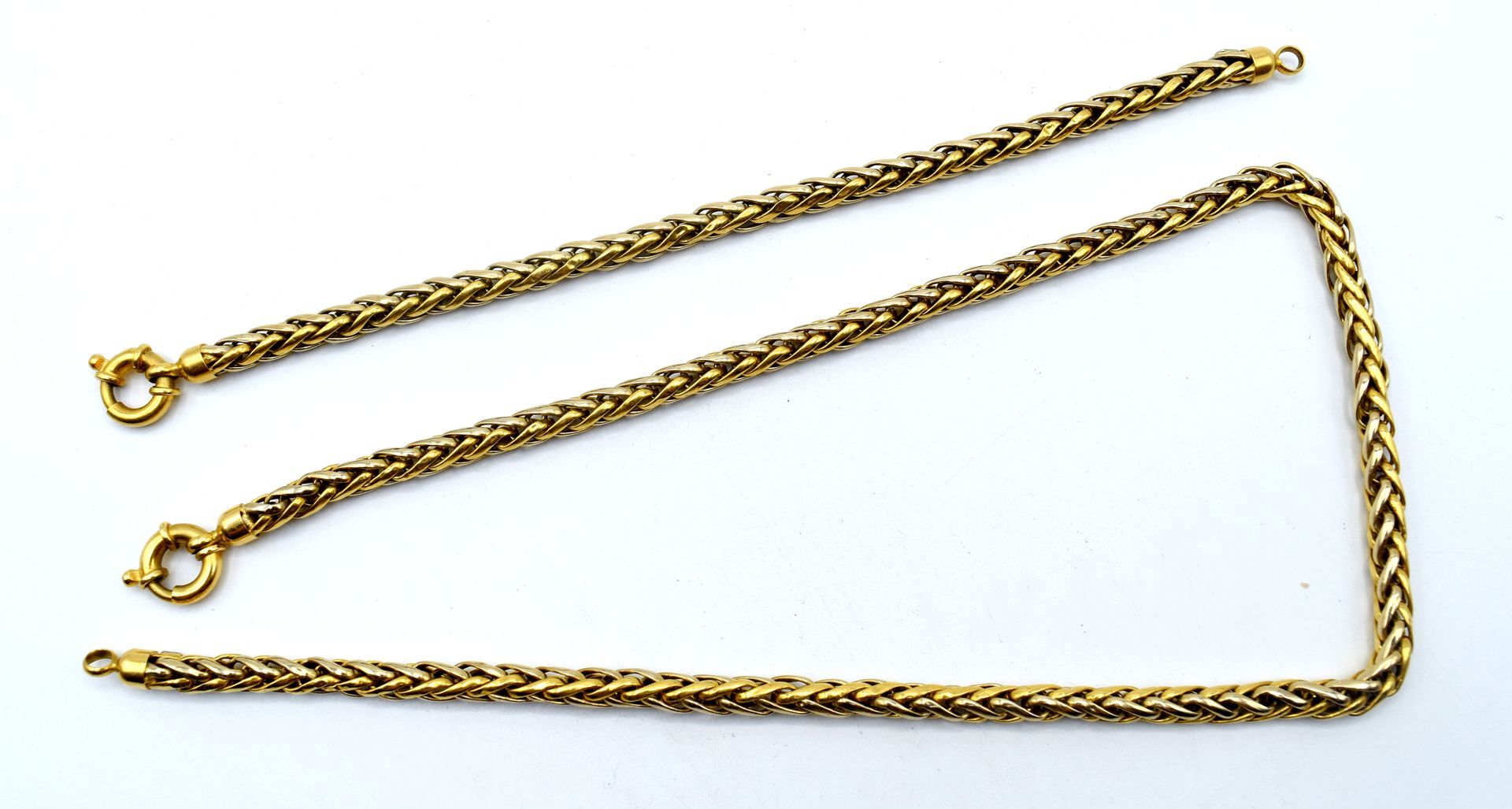 Null 18K黄金和白金项链和手镯（损坏，凹陷）- 31.4克（45.5和19厘米）

NL :

 臂章和18K地质和机织品（有瑕疵，无瑕疵）-31.4克（&hellip;