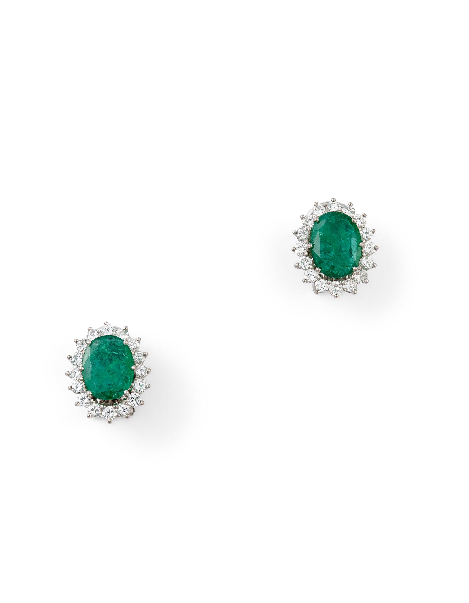 Null EMERALD AND DIAMOND EARRINGS In 18K white gold, each set with an oval emera&hellip;