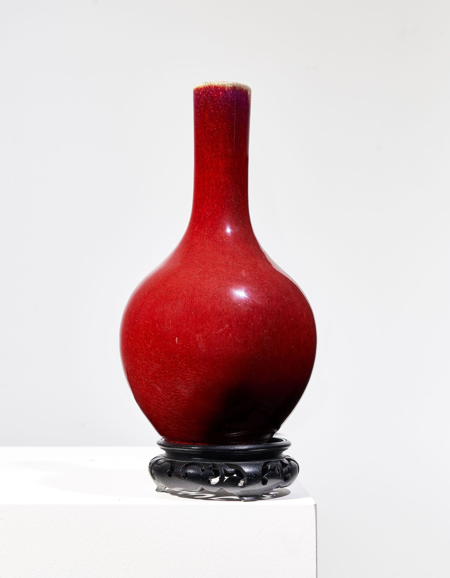Null A FLAMBE-GLAZE BOTTLE VASE

Late Qing dynasty (1644-1911) 

Of deep red col&hellip;