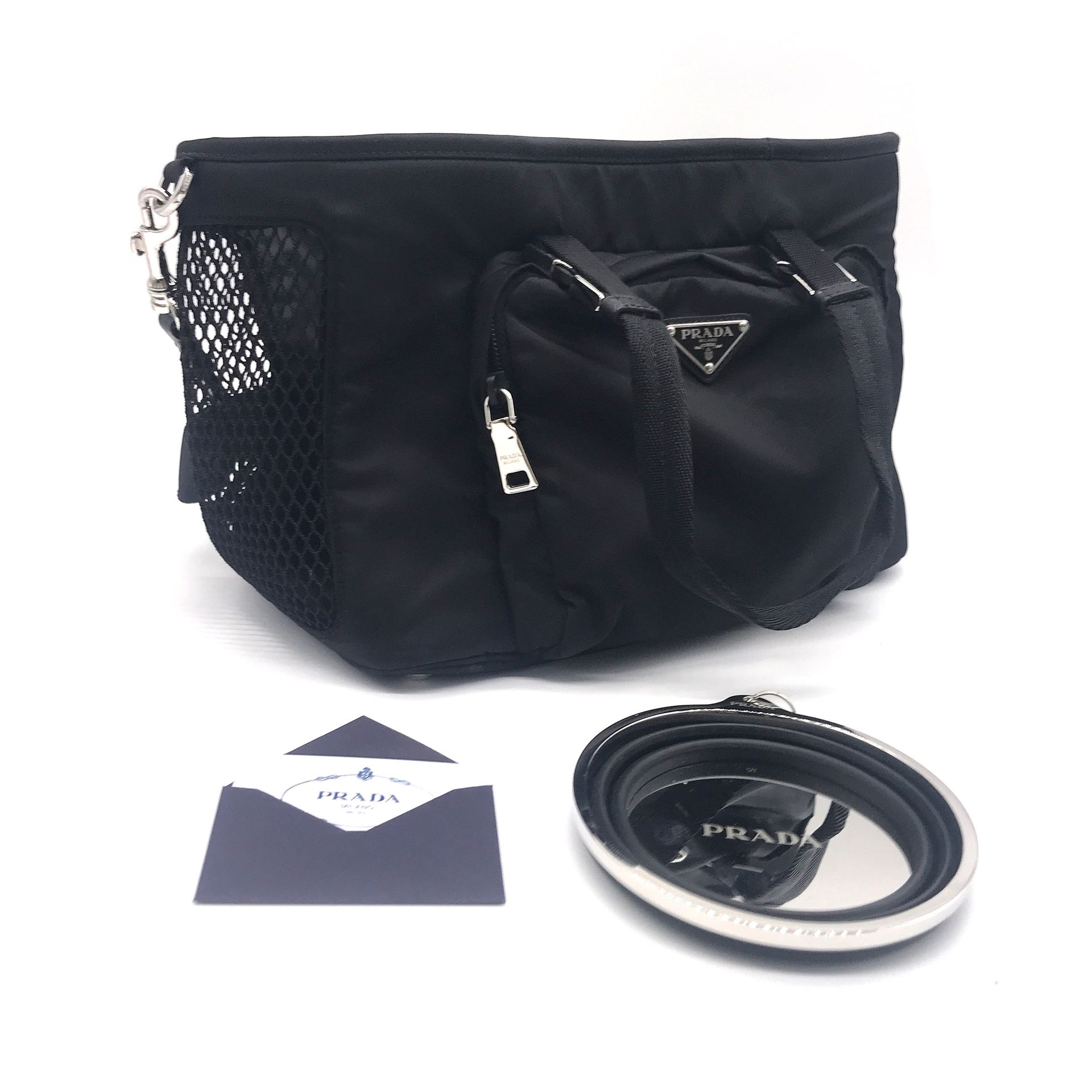 PRADA Small dog bag in black nylon, zippered pocket on…