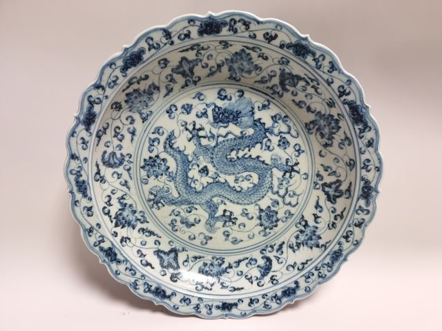 Null CHINA. A blue-white porcelain dish with a Yongle style decoration of dragon&hellip;