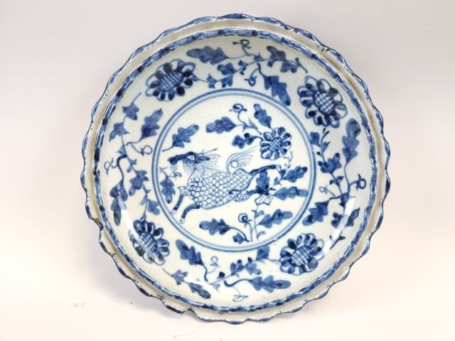 Null CHINA. A blue and white porcelain dish decorated with deer, a lobed wing wi&hellip;