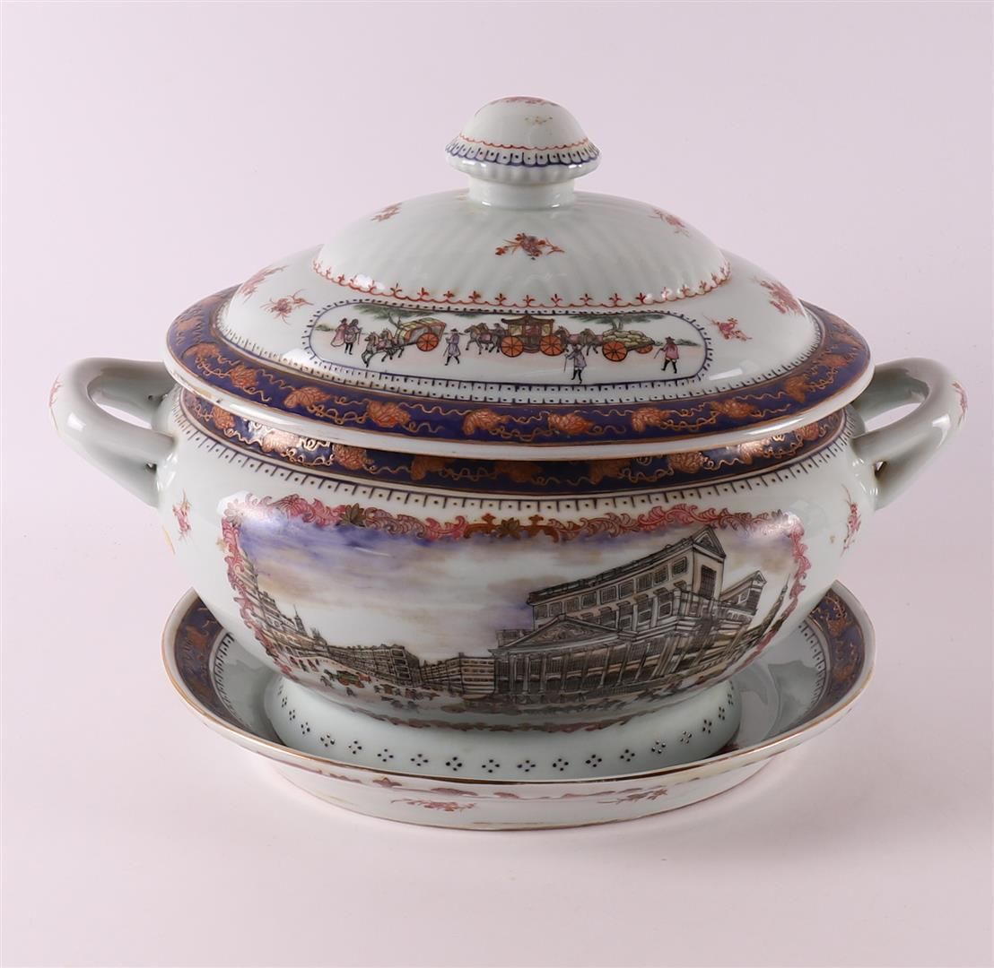 Null An oval porcelain lidded dish on a saucer, 20th century.
