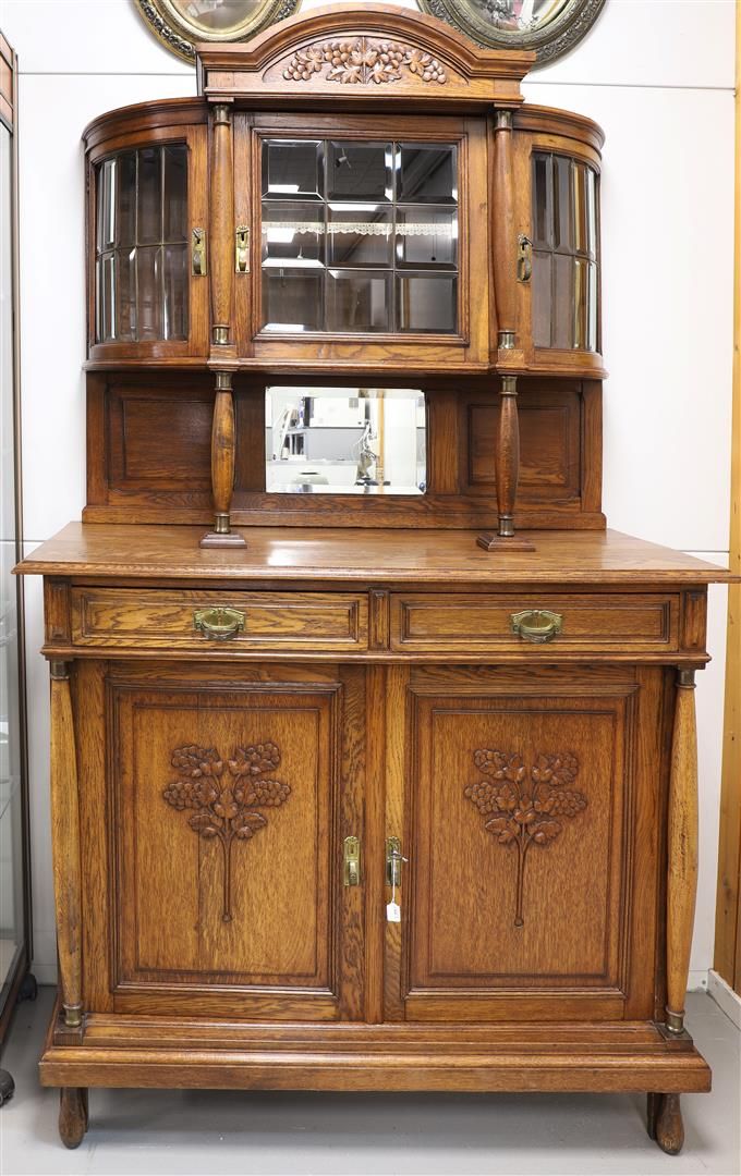 Null A sideboard with display case, early 20th century.
