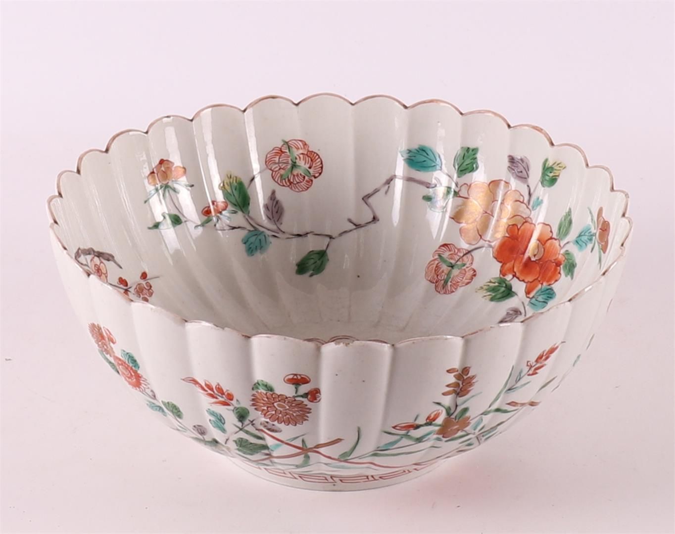 Null A contoured porcelain bowl on a base ring, Japan, 19th century.