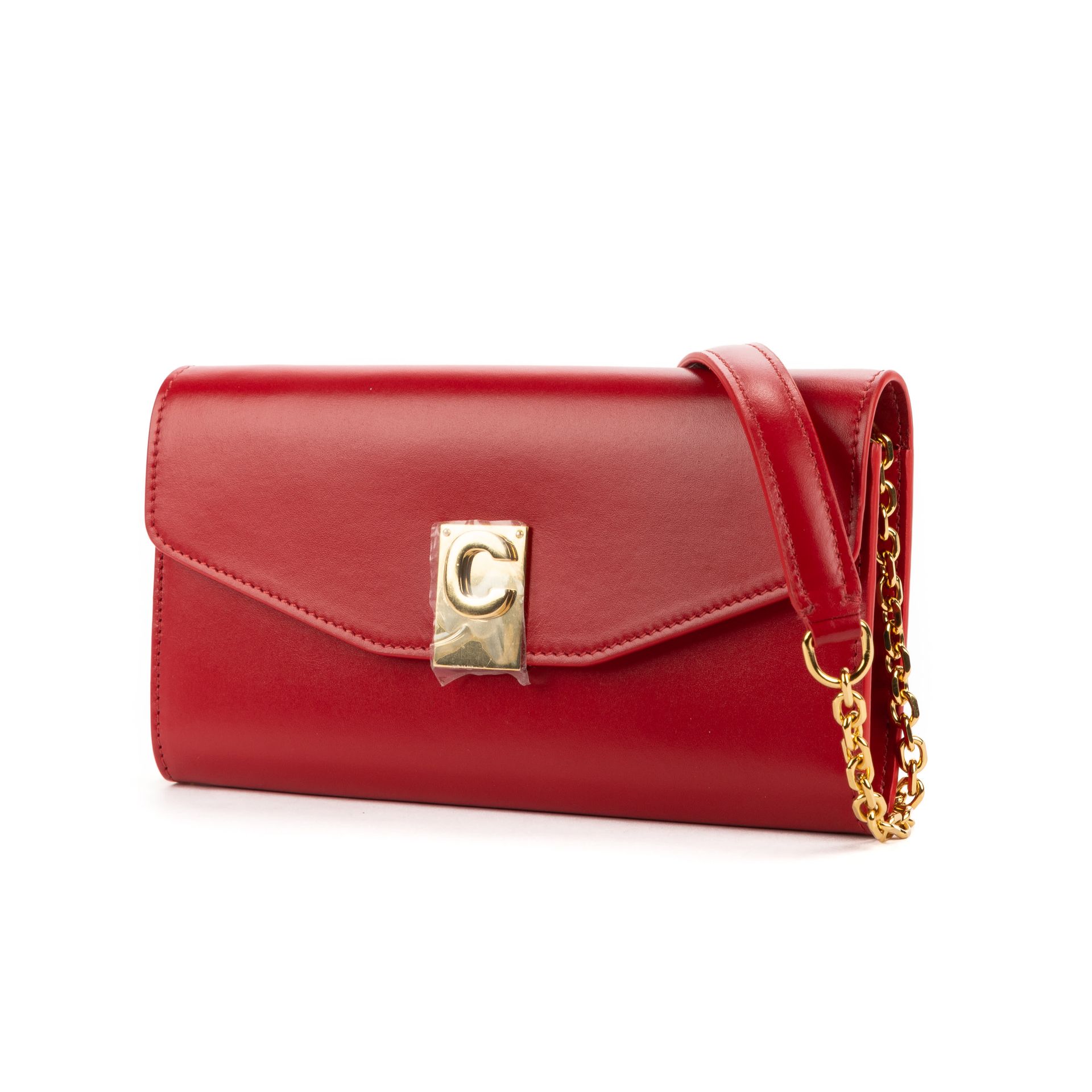 Pre-Loved Celine Clutch in Red Smooth Leather. Gold Bras…
