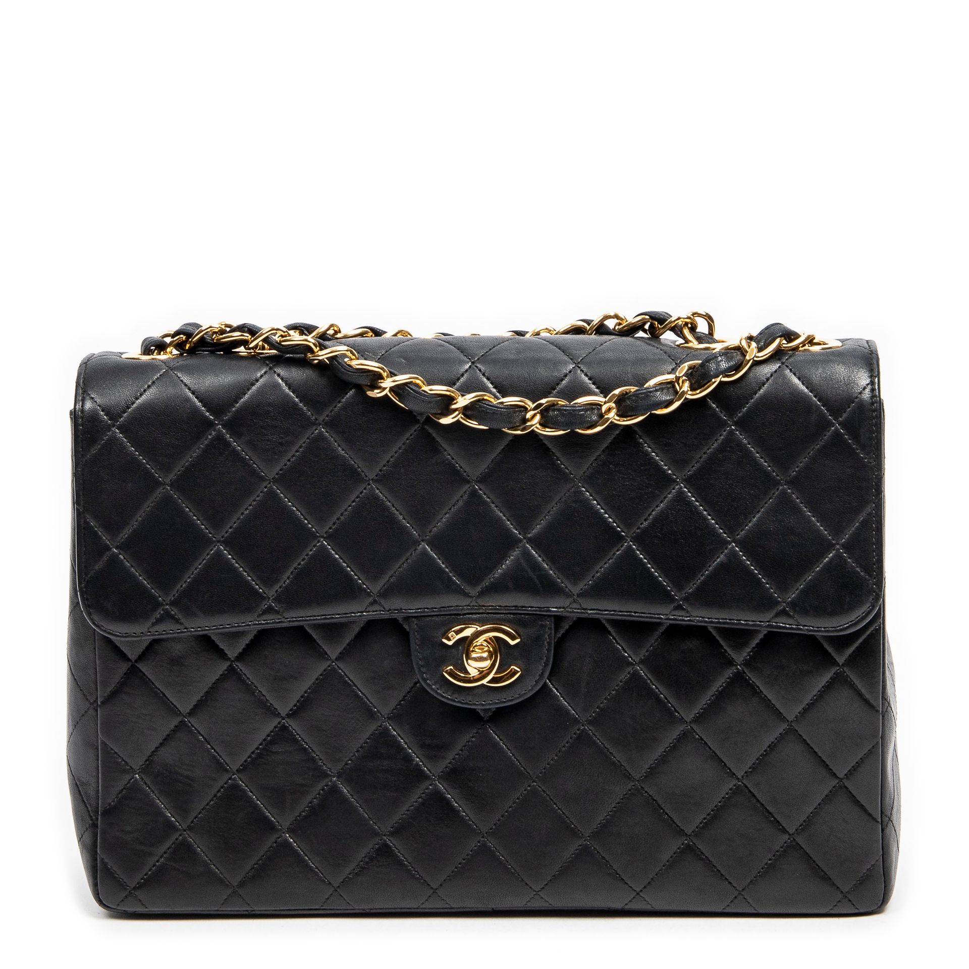 Pre-Loved Chanel Jumbo Classic Single Flap in Black Quil…