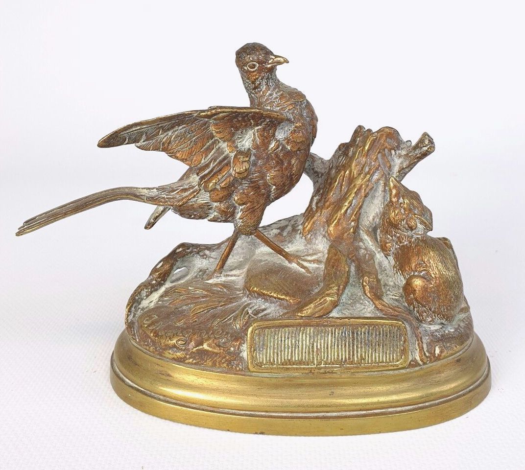 Null 儒勒-莫尼耶兹（1835-1894）。

野鸡和狐狸。

青铜，带有金色的铜锈。

高_12,5厘米 宽_16厘米 深_8厘米