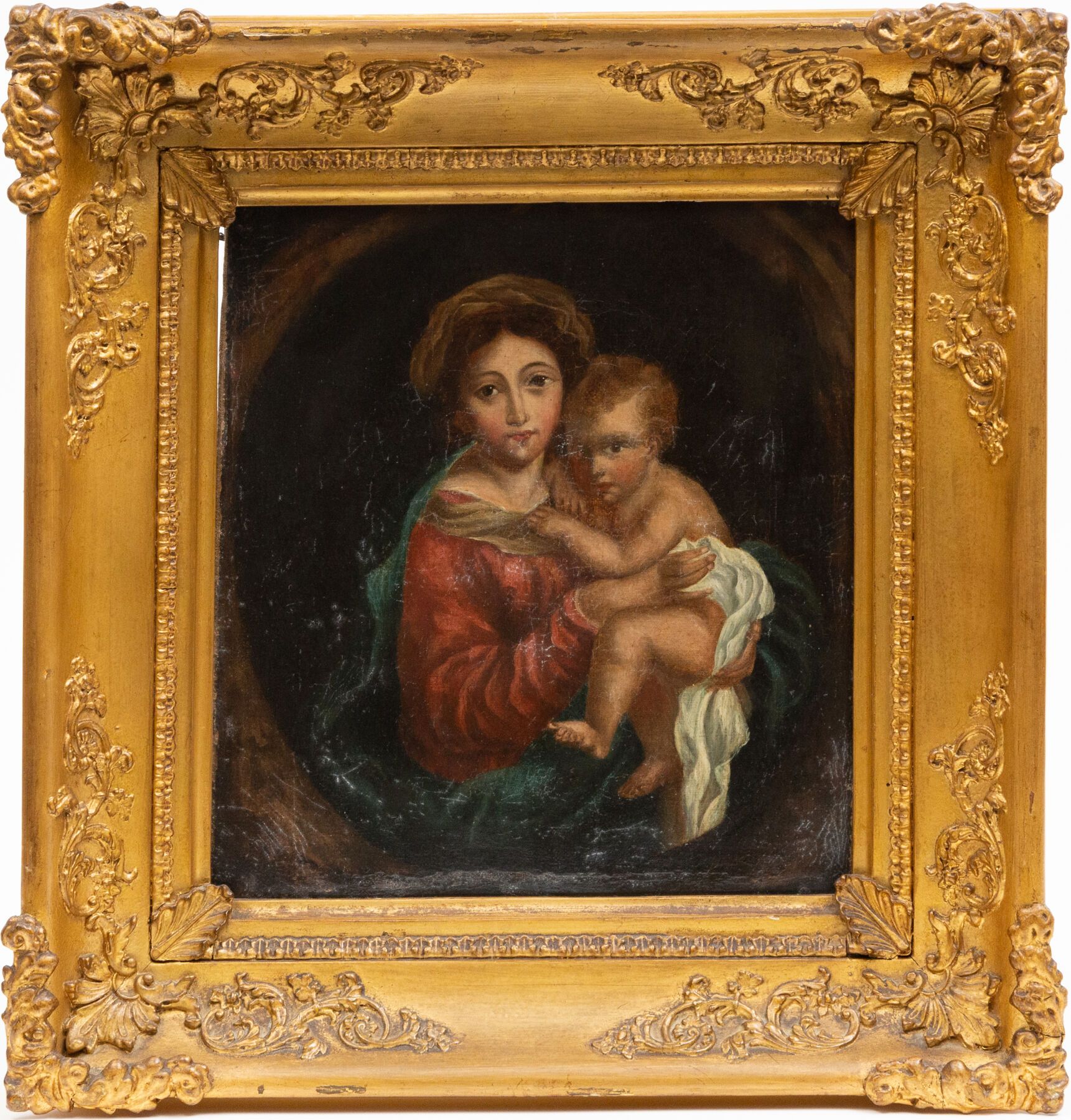 Null 18世纪的意大利学校。
圣母和孩子。
布面油画。 
高_25,5厘米，宽_23厘米，装框
装在一个雕刻和镀金的木框里。