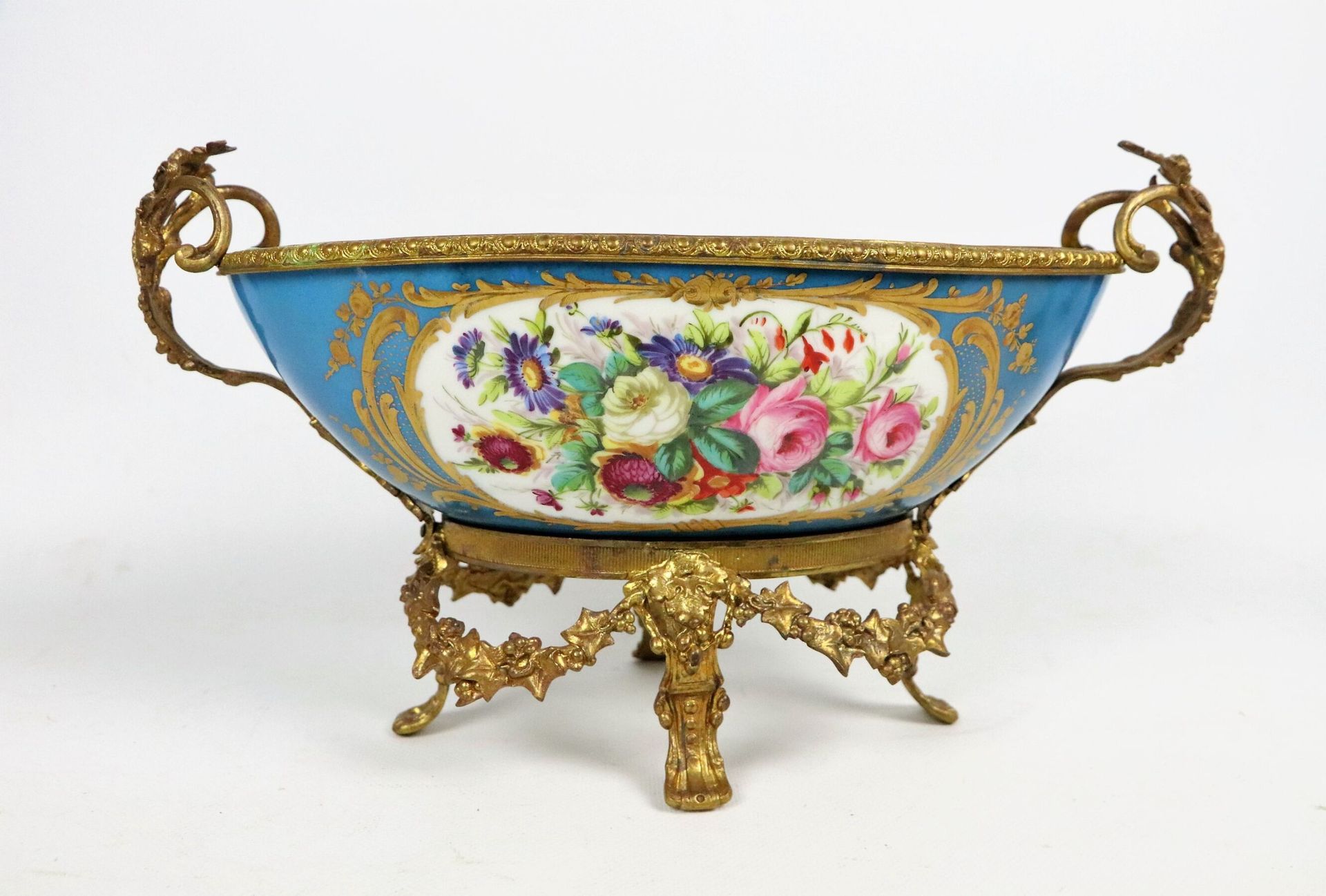 Null SEVRES, in the taste of. 
A porcelain jardinière on an azure blue backgroun&hellip;