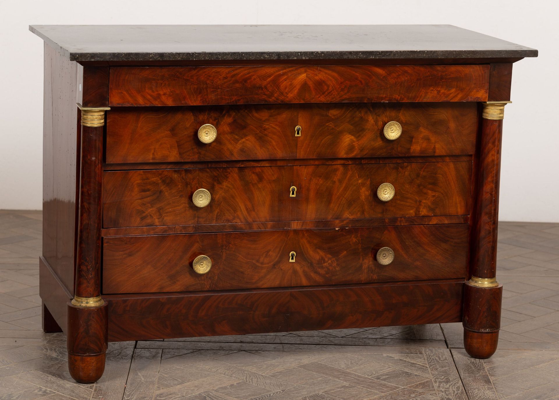 Null Mahogany and mahogany veneer chest of drawers with ormolu ornamentation.
It&hellip;