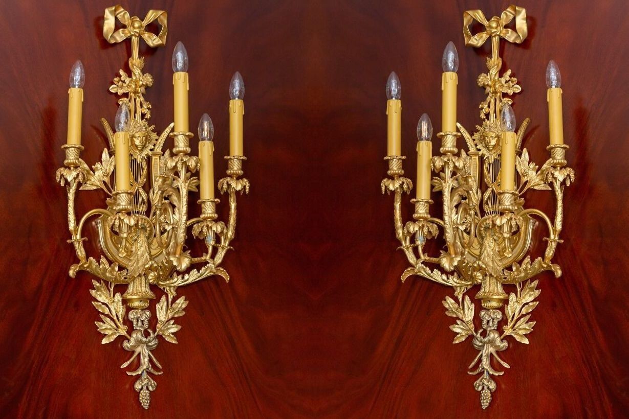 Null Pair of large five-light ormolu sconces decorated with radiating female mas&hellip;