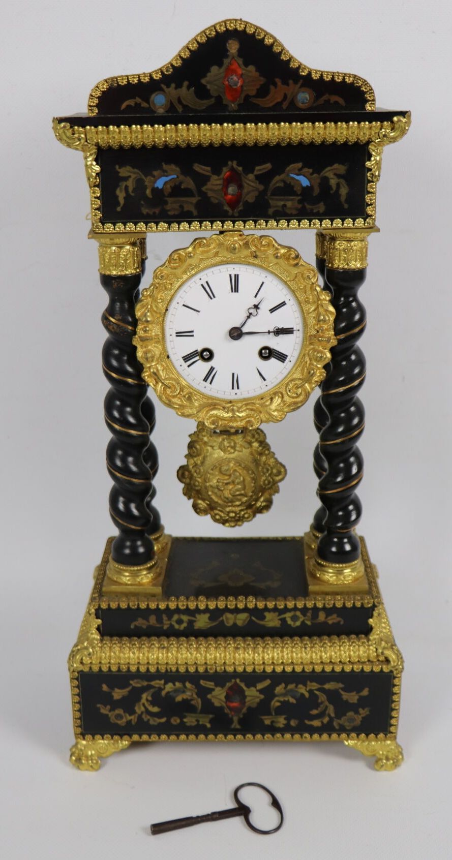Null Portico clock in blackened wood and gilded brass marquetry, with polychrome&hellip;