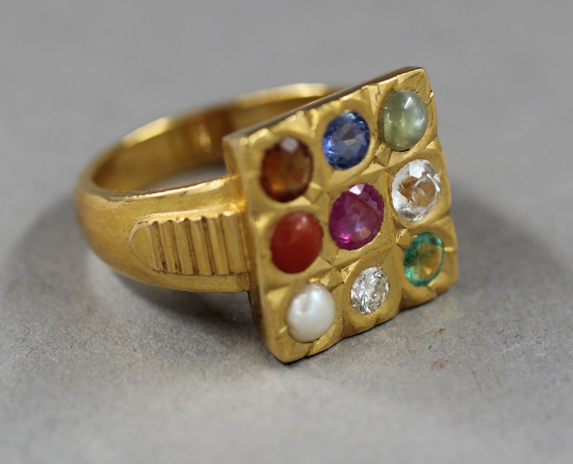 Null Square ring in 18k yellow gold set with nine coloured stones, weight: 9.8 g&hellip;