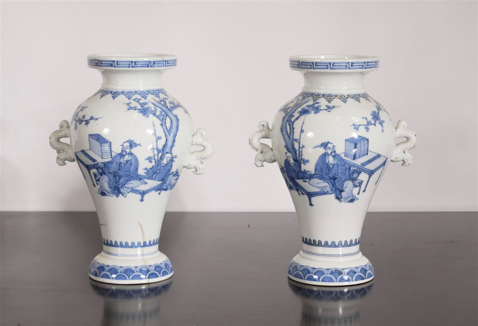 Null Pair of two-handled baluster vases in white porcelain with white-blue decor&hellip;