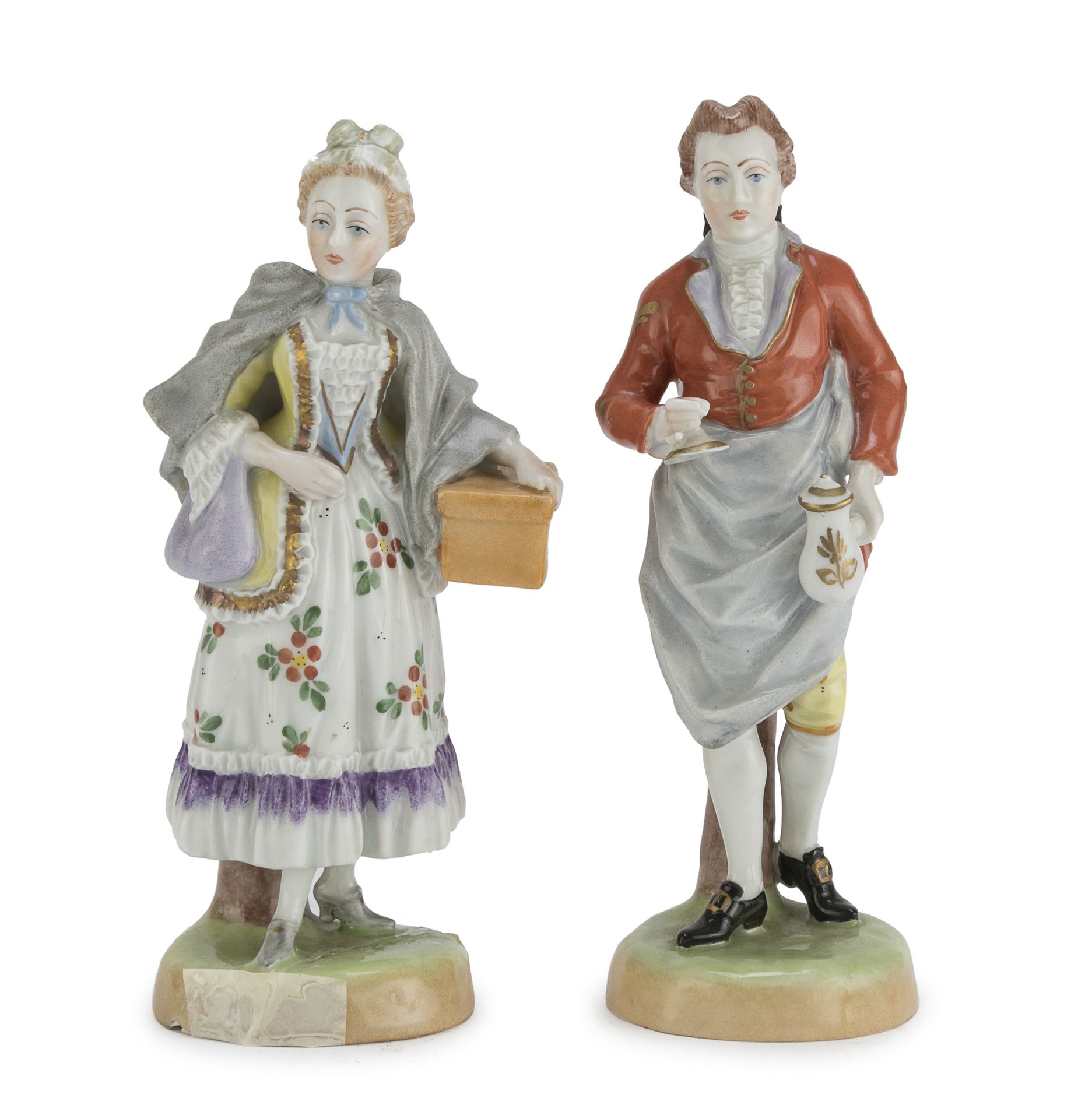 Null 一对瓷器人物，德累斯顿 20世纪

多色的，描绘的是一个服务员和一个女仆。

底座下有标记。

尺寸为15 x 7 x 5厘米。