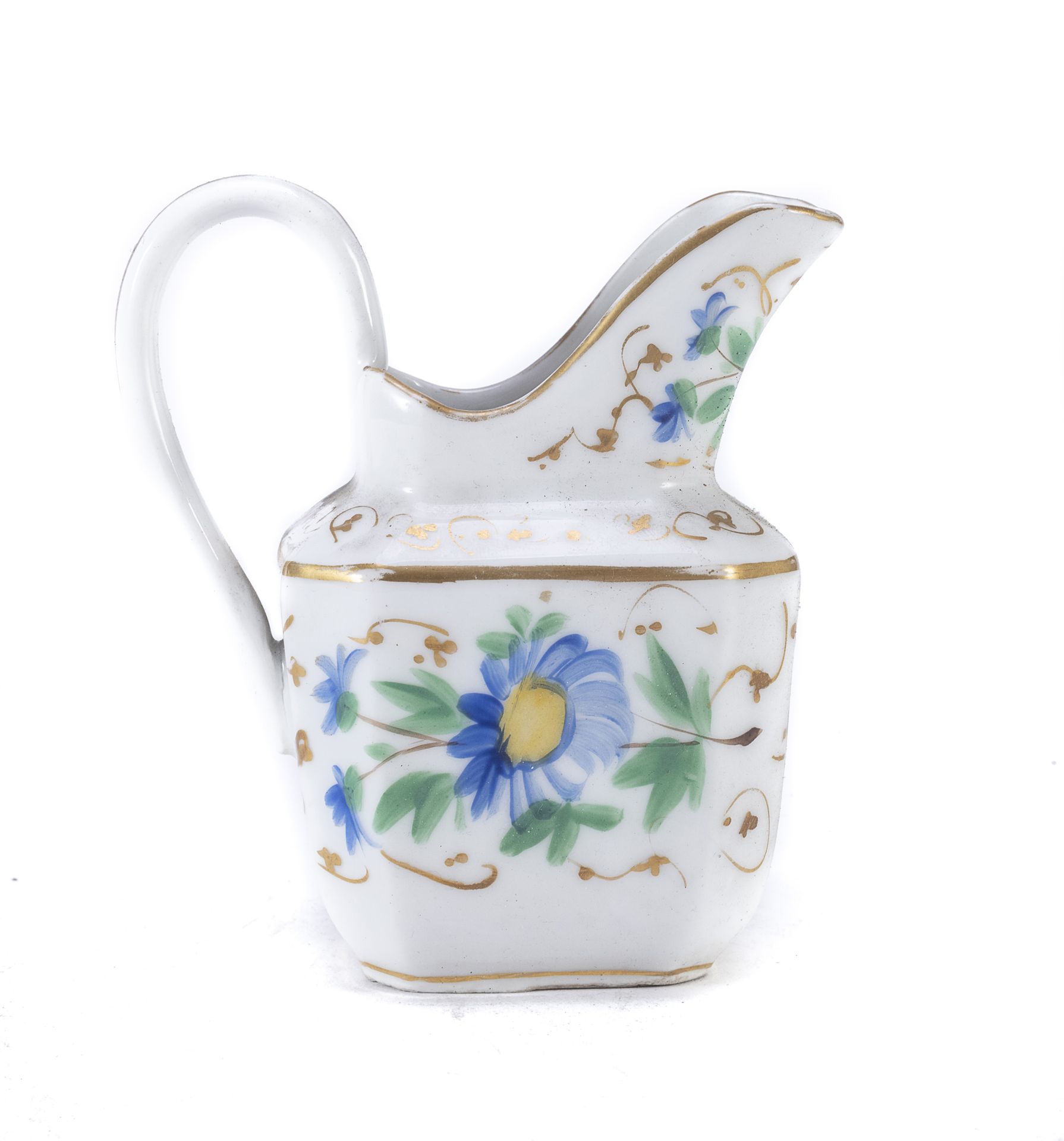 Null 瓷质牛奶壶，19世纪

有花和金的装饰。

尺寸为13 x 6 x 10厘米。
