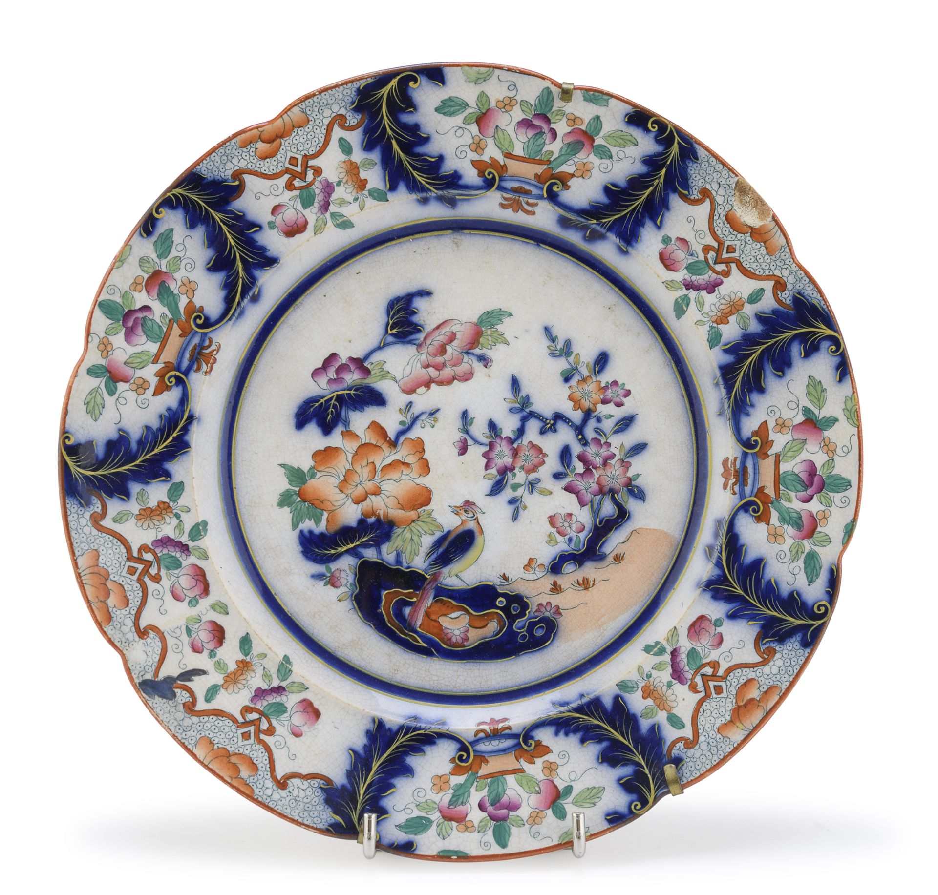 Null 陶器盘，英国，19世纪


多色的伊万里装饰。


底下的品牌名称。


直径24厘米。


裂缝。