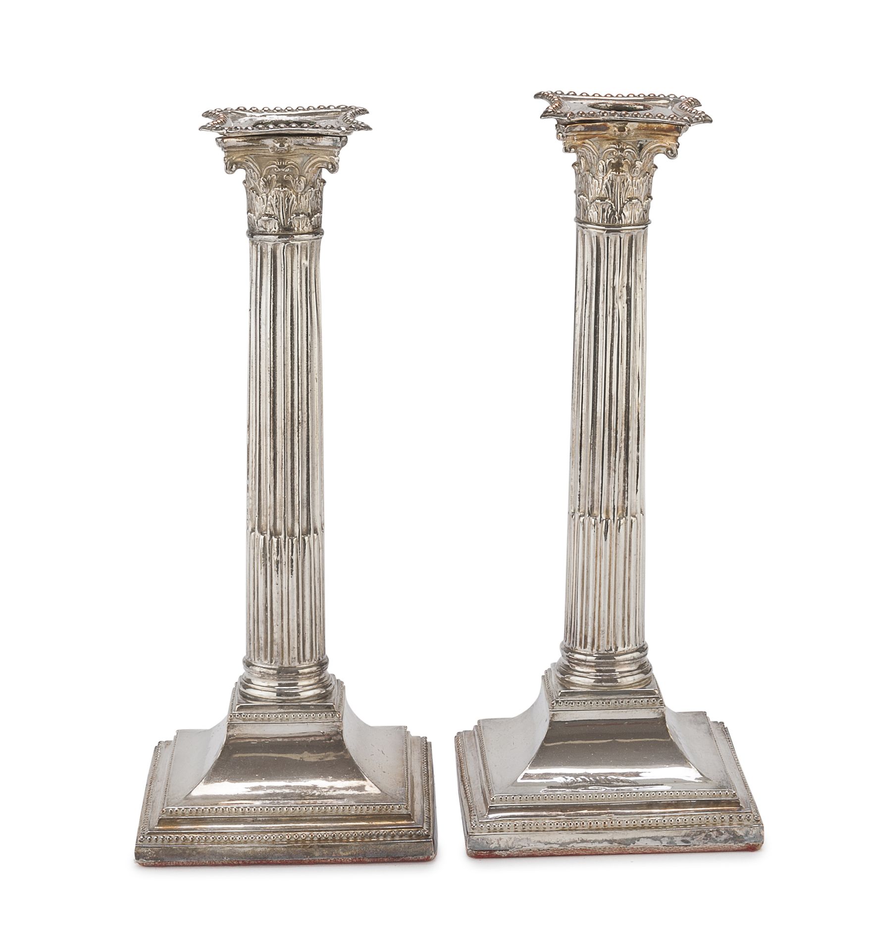 Null PAIR OF SILVER-PLATED CANDLESTICKS