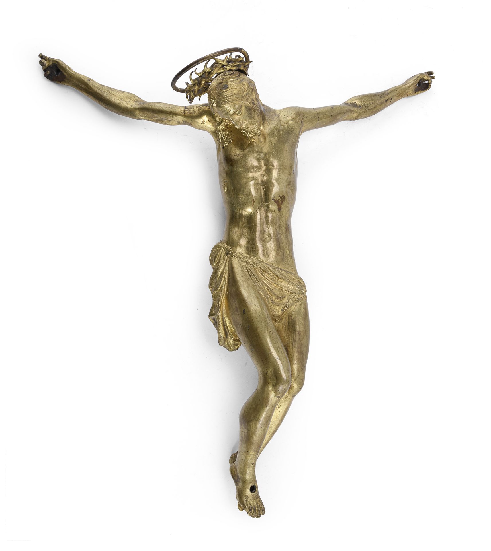 Null 镀金铜质基督雕塑，18世纪

伸出双臂，戴着荆棘冠冕。

尺寸为36 x 36厘米。

一些减免。