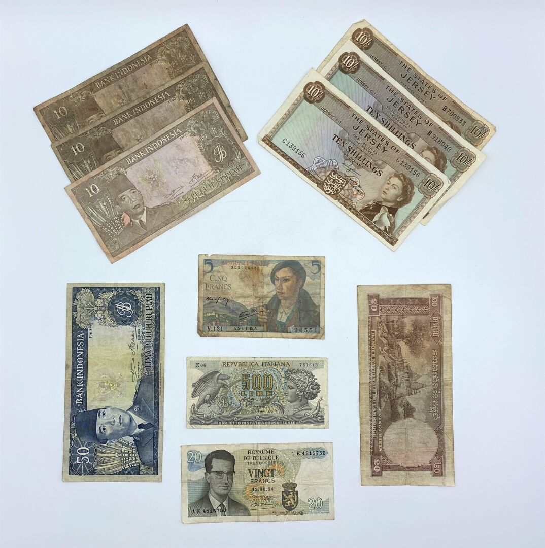 Null 11张古董钞票的套票。

包括 :

- 一张5法郎的Berger 1945纸币。

- 三张10先令的泽西岛纸币，约1950/60年

- 三张印尼&hellip;