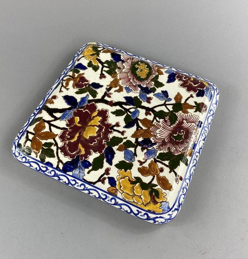 Null Gien, 

Large polychrome earthenware trivet decorated with peonies.

46 x 4&hellip;