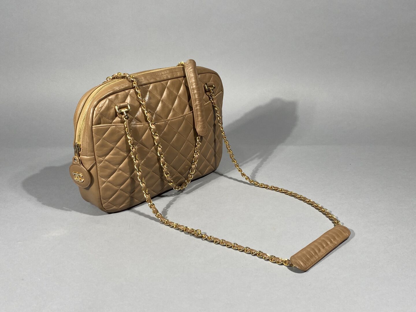 Chanel, Bag model Camera in beige quilted lambskin, …